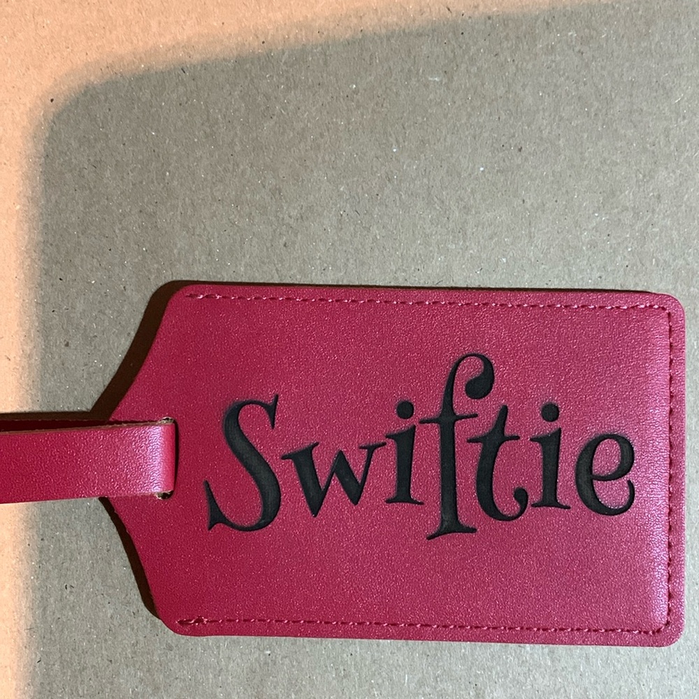NEW. Taylor Swift leather tag